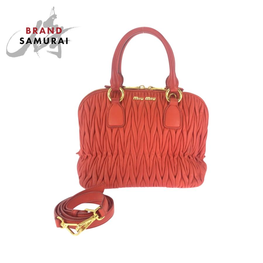 miu miu（ミュウミュウ） マテラッセ オレンジ ゴールド金具 レザー 