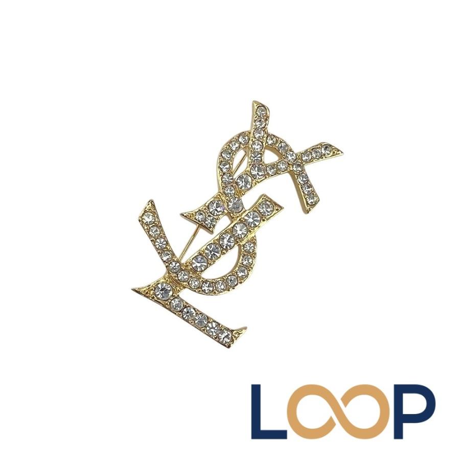 サンローラン ■新同■ カサンドラ ロゴ ブローチ アクセサリー ラインストーン ゴールド GP 【672507】1 | 