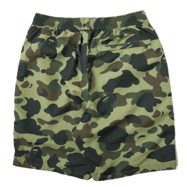 A BATHING APE ア ベイシング エイプ 1ST CAMO BEACH PANTS カモフラージュベンチパンツ 001SPF301002X M グリーン BAPE ショーツ g14695 |  | 01