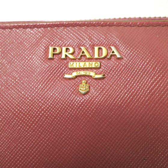 PRADA プラダ サフィアーノレザー ジップアラウンド ロングウォレット ピンク ラウンドファスナー 長財布 rr194 |  | 02
