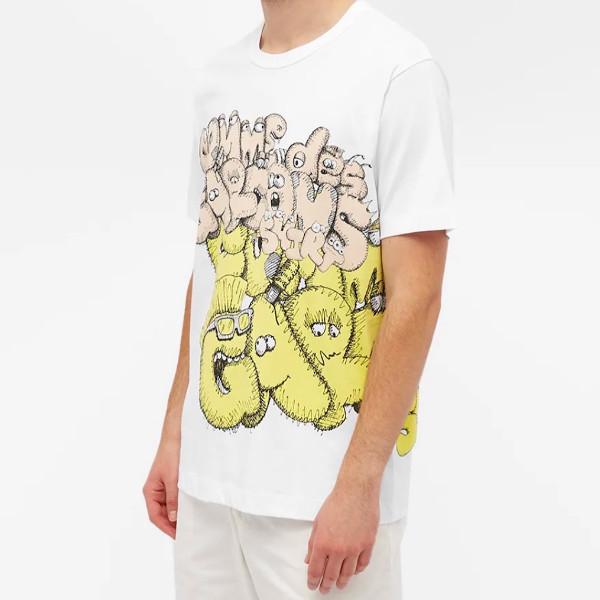 COMME des GARCONS（コムデギャルソン） シャツ X カウズ Wネーム T