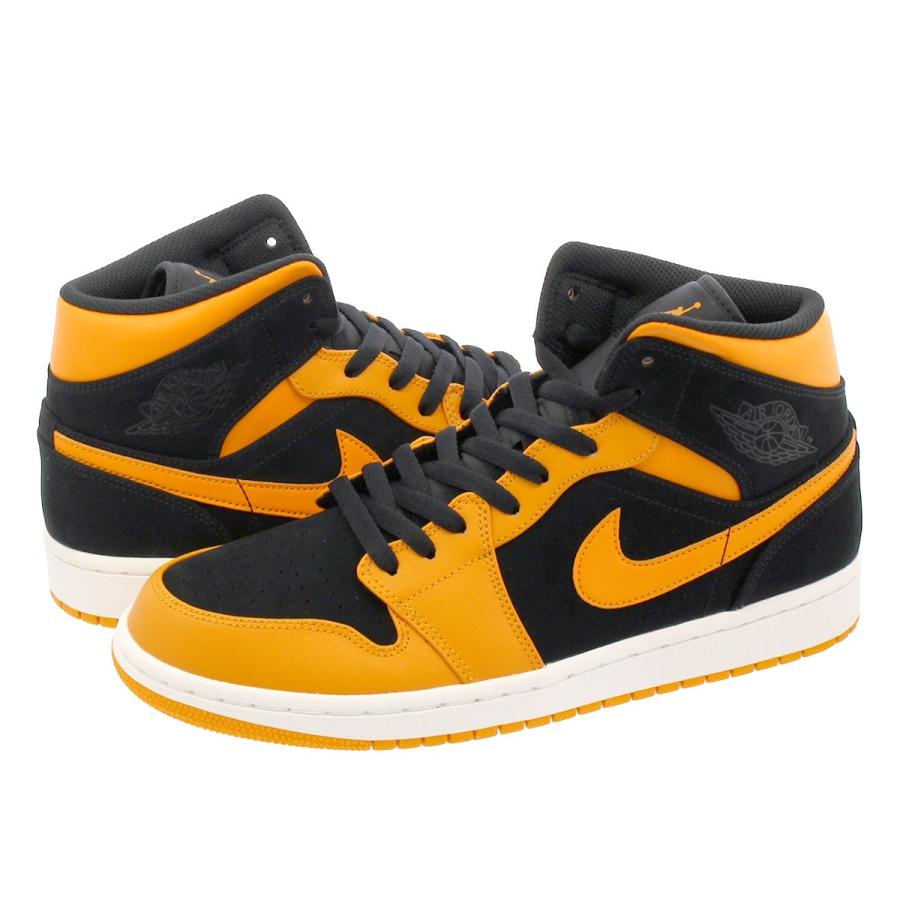jordan 1 mid black orange peel