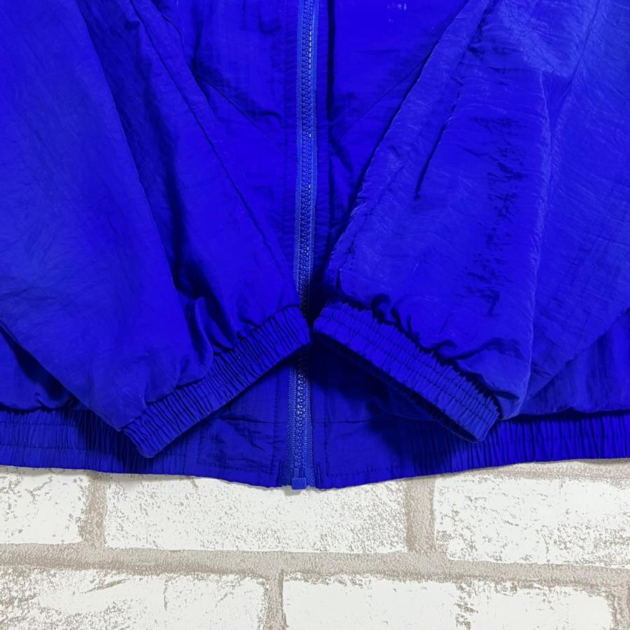 Reebok（リーボック） 【古着】 ナイロンジャケット 青 XLサイズ