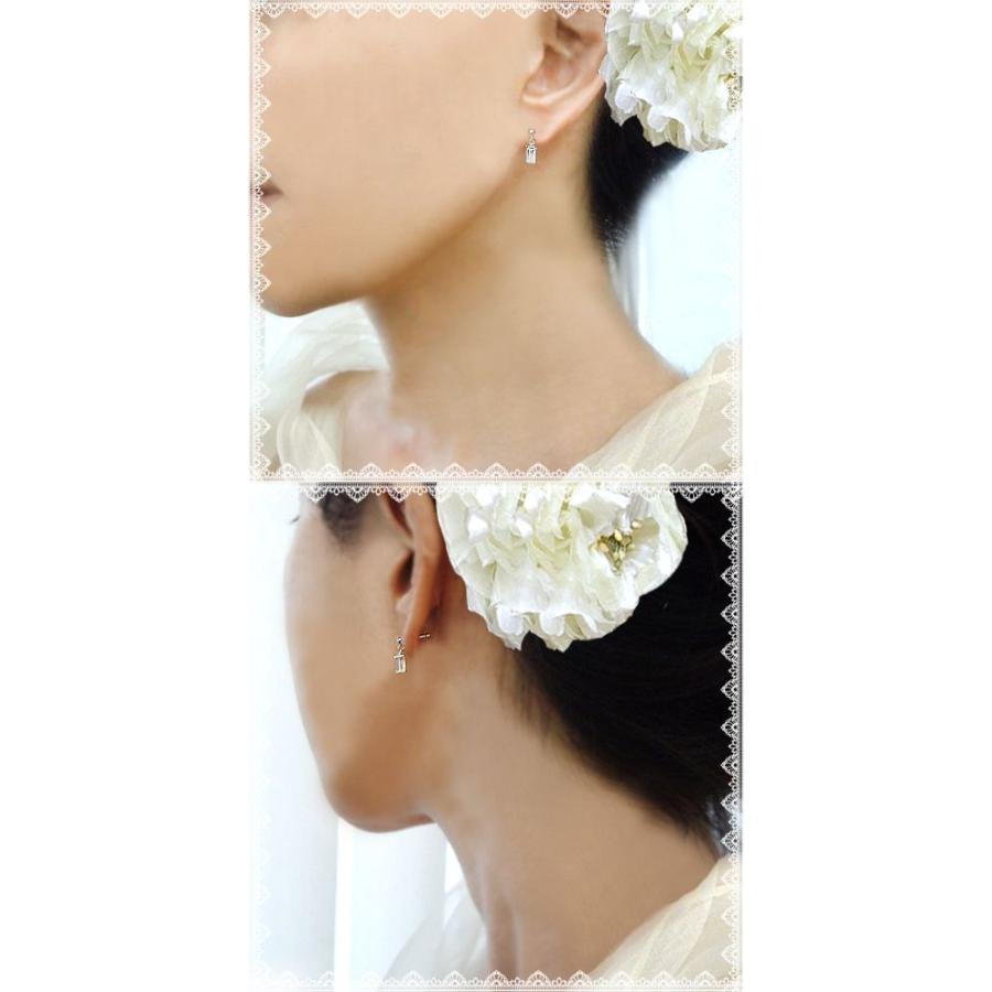 揺れるダイヤモンドピアス pt900 0.5ct エメラルドカット ダイヤモンド