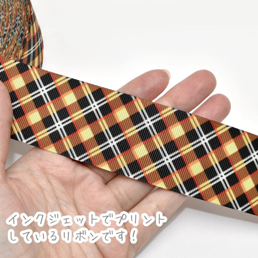 プリントリボン 黒とオレンジイエローのチェックリボン 幅38mm 1m単位