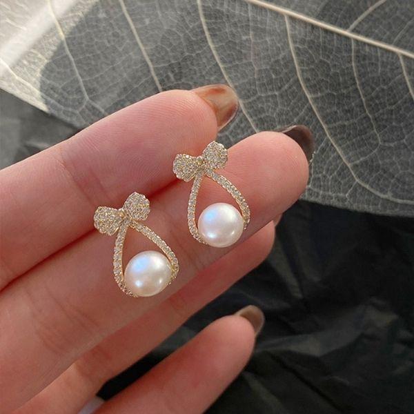 ピアス 18金 アレルギー対応 シンプル つけっぱなし パール リボン レディース |  | 03