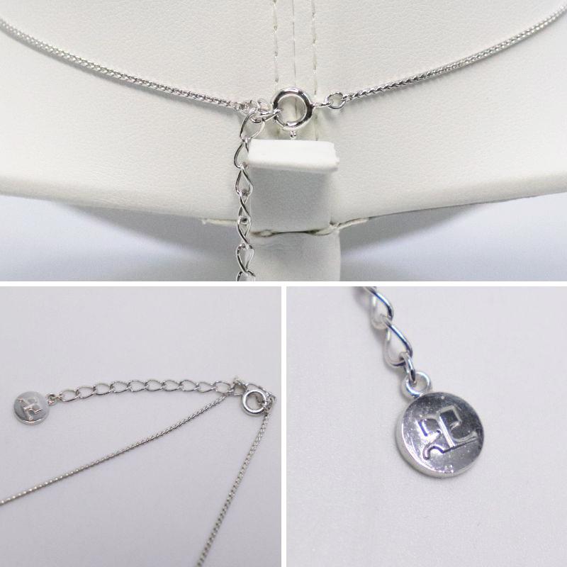 courreges クレージュ カラーストーン付 フラワーモチーフ Y字