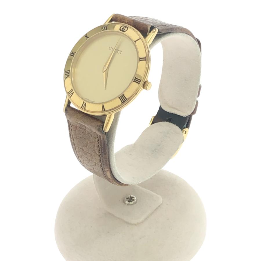 質屋 不動 腕時計 GUCCI グッチ 3000.2.M クォーツ QZ ラウンド