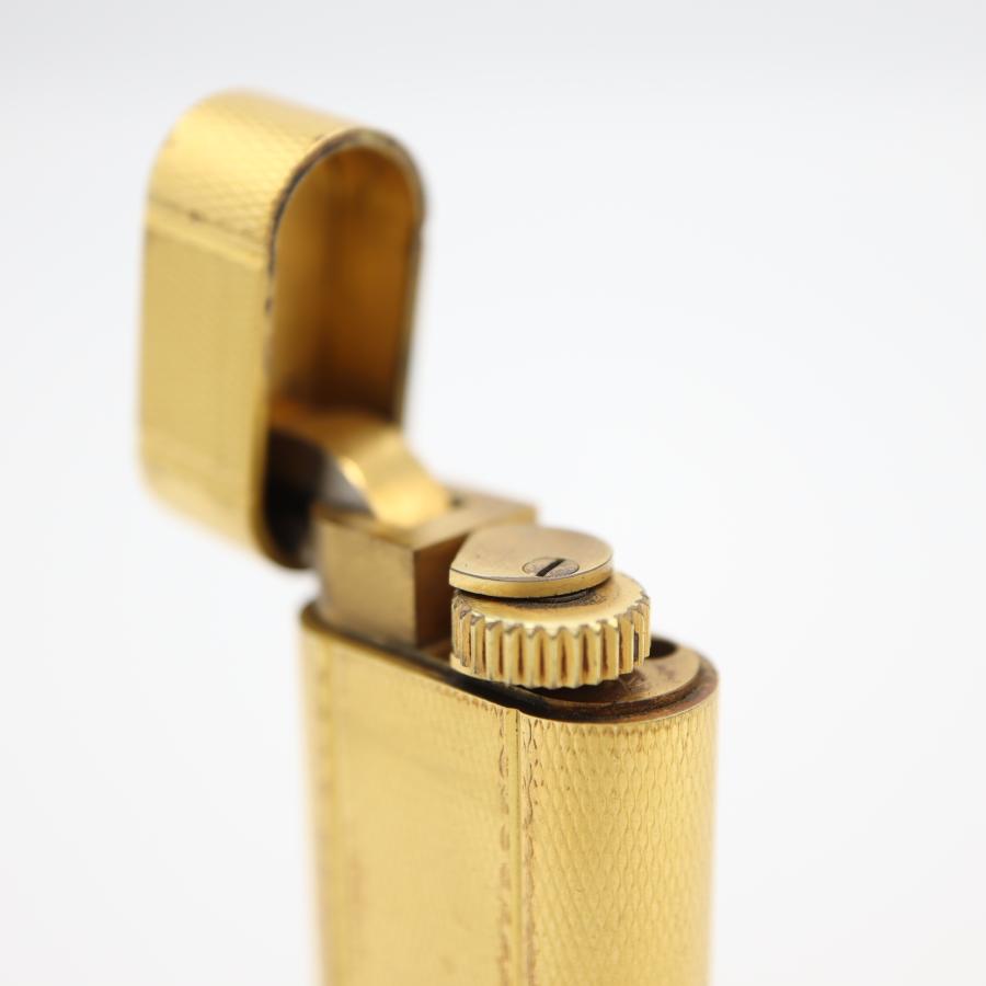 質屋 Cartier カルティエ ガスライター オーバル型 総柄 ゴールド 