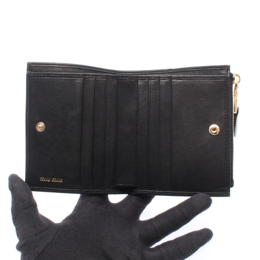 ミュウ エンボスロゴ ブランドオフ Miu レザー 二つ折り財布
