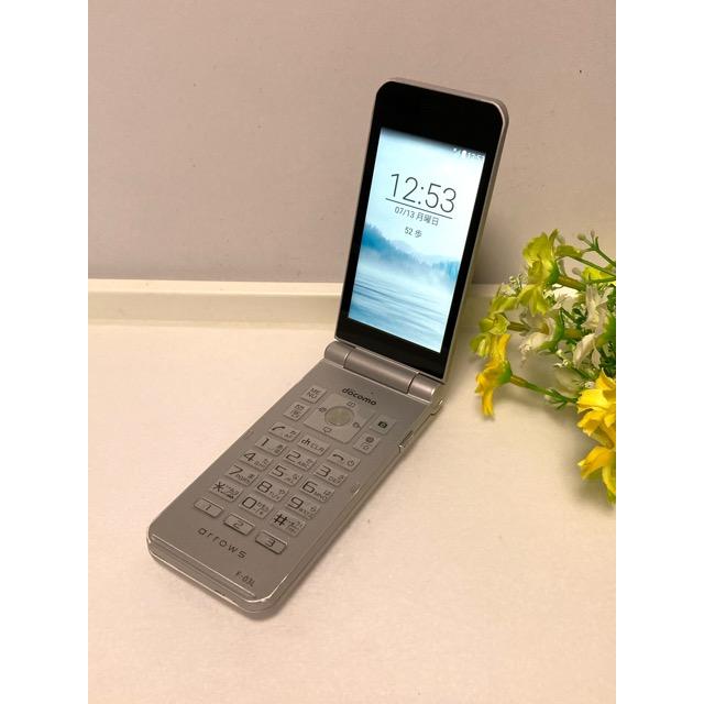arrows ケータイ F-03L シルバー ドコモ SIMロック解除済み 中古 訳あり 初期化済 ☆折りたたみケータイ☆ 送料無料 A6540 | arrows