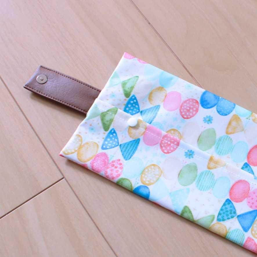 ポケットティッシュケース・ライトブルーりぼん柄 ハンドメイド】 携帯用ボックスティッシュケース つや消しラミネート