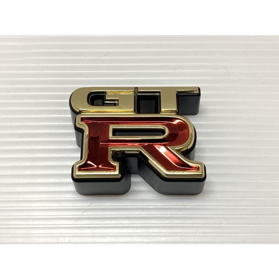 □□ R34 スカイライン フロント ゴールド GTR エンブレム レプリカ □□ パーツアシスト製 NISSAN skyline BNR34 RB26 V-SPEC nismo |  | 01