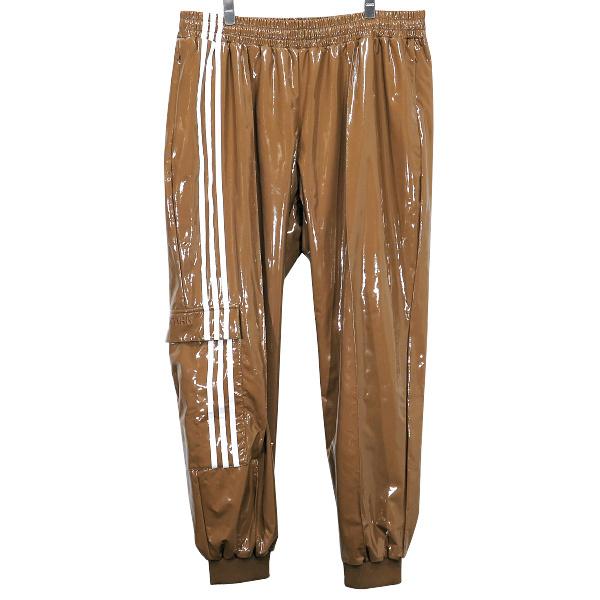 アディダス adidas パンツ IVY Park LATEX TRACK PANTS  H33306 アイビーパーク ラテックス トラック パンツ ブラウン ボトムス ジャージー｜nanainternational