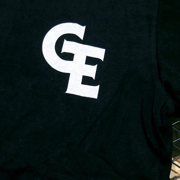 GOODENOUGH（グッドイナフ） GE 星条旗 サークルGプリントTシャツ