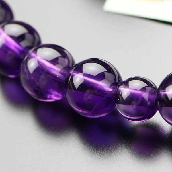 数珠 女性用 約8ミリ 4A´ 紫水晶 2色梵天房 数珠袋付きの画像