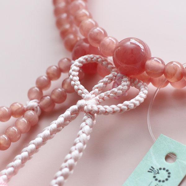 浄土真宗 数珠 女性用 8寸 5A´ ロードクロサイト 銀花かがり房 数珠袋付きの画像