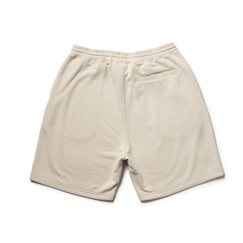 ロゴ入りショートパンツ ベージュ×ネイビー XTFSH02H2 配色 コットンテリー ショートパンツ (単品)