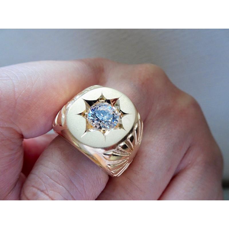 仁尾彫金『一つ星ジルコニア太陽のゴールド楕円印台リング