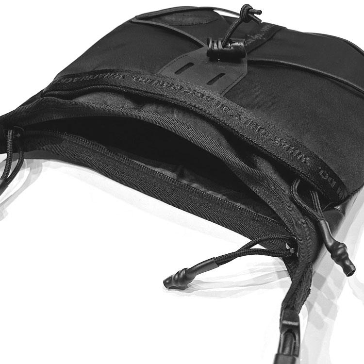 WHITE MOUNTAINEERING（ホワイトマウンテニアリング） WM × BRIEFING