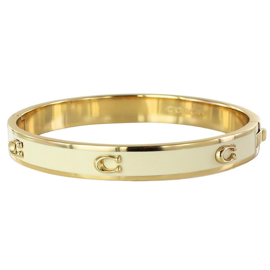COACH コーチ バングル ブレスレット アイボリー ゴールド