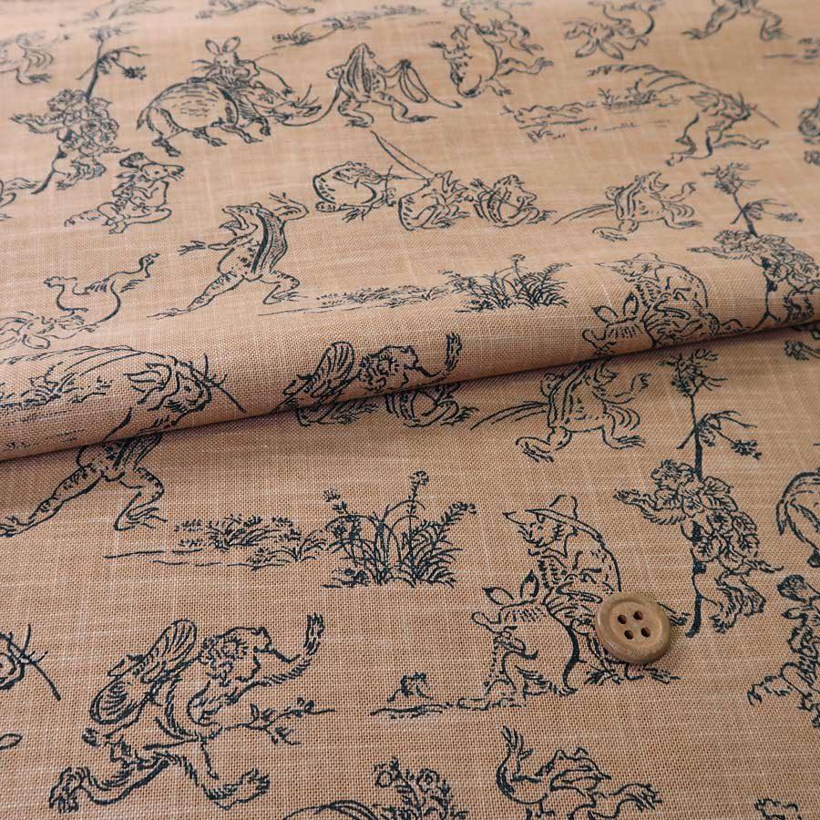 和柄コットン生地・鳥獣人物戯画(きゃら色) 10cm単位 切り売り | 