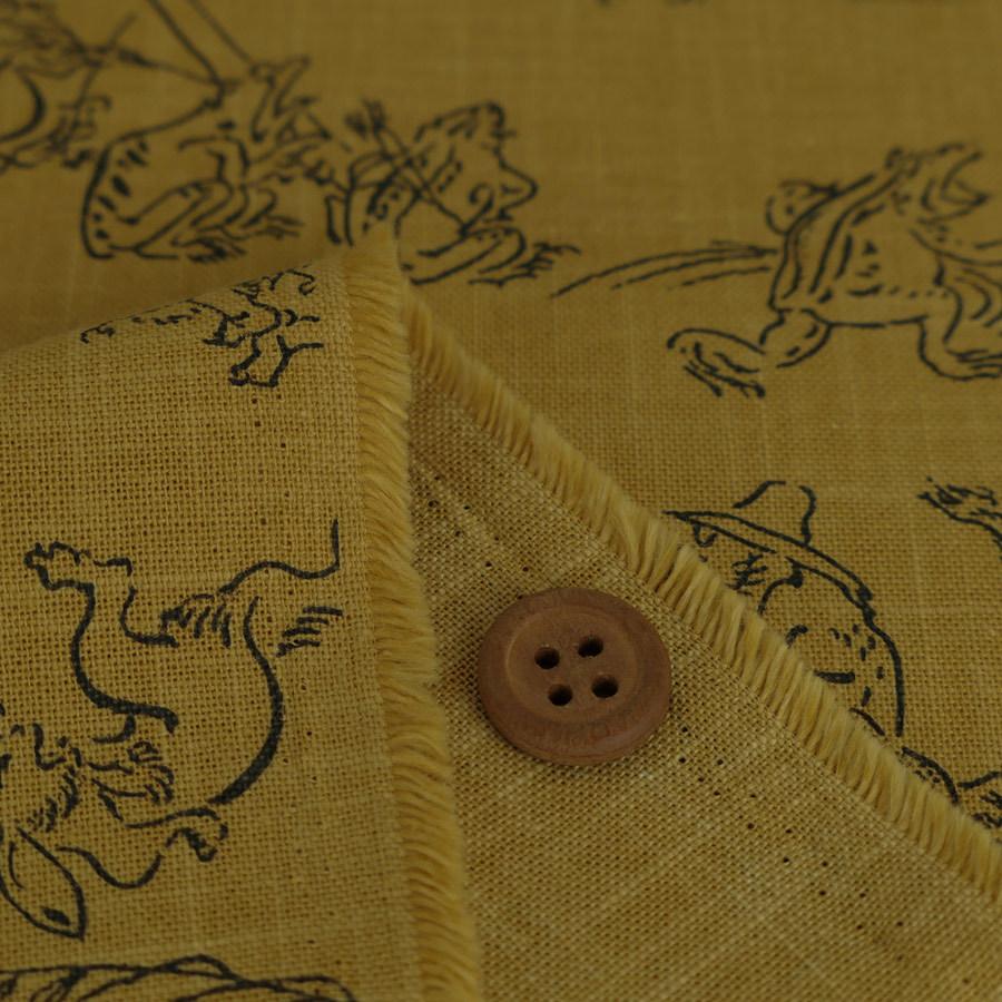 和柄コットン生地・鳥獣人物戯画(からし色) 10cm単位 切り売り |  | 01