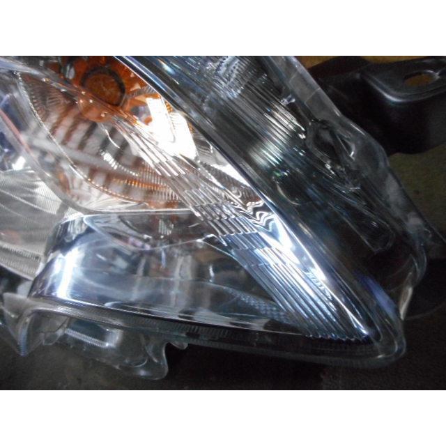 ラクティス DBA-NCP125 右ヘッドランプASSY 1500 G 1NZ-FE 209 黒 52