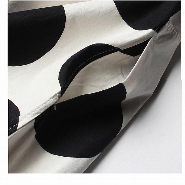 大きなドット柄ワンピース ノースリーブ 水玉 避暑 海 黒色 膝下 A