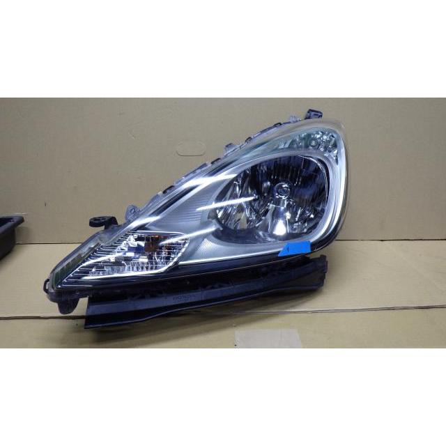 フィット DBA-GE6 左ヘッドランプASSY 左ライト スタンレー P9604