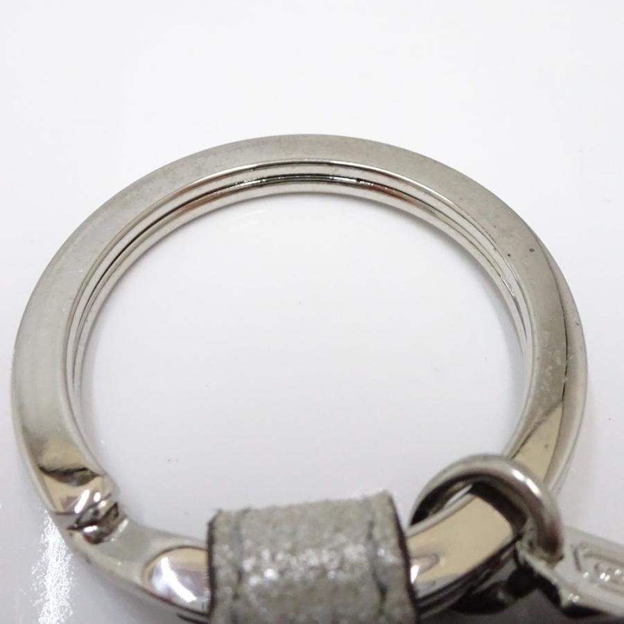 COACH（コーチ） 手帳型 バッグチャーム フォトケース スノーフレーク