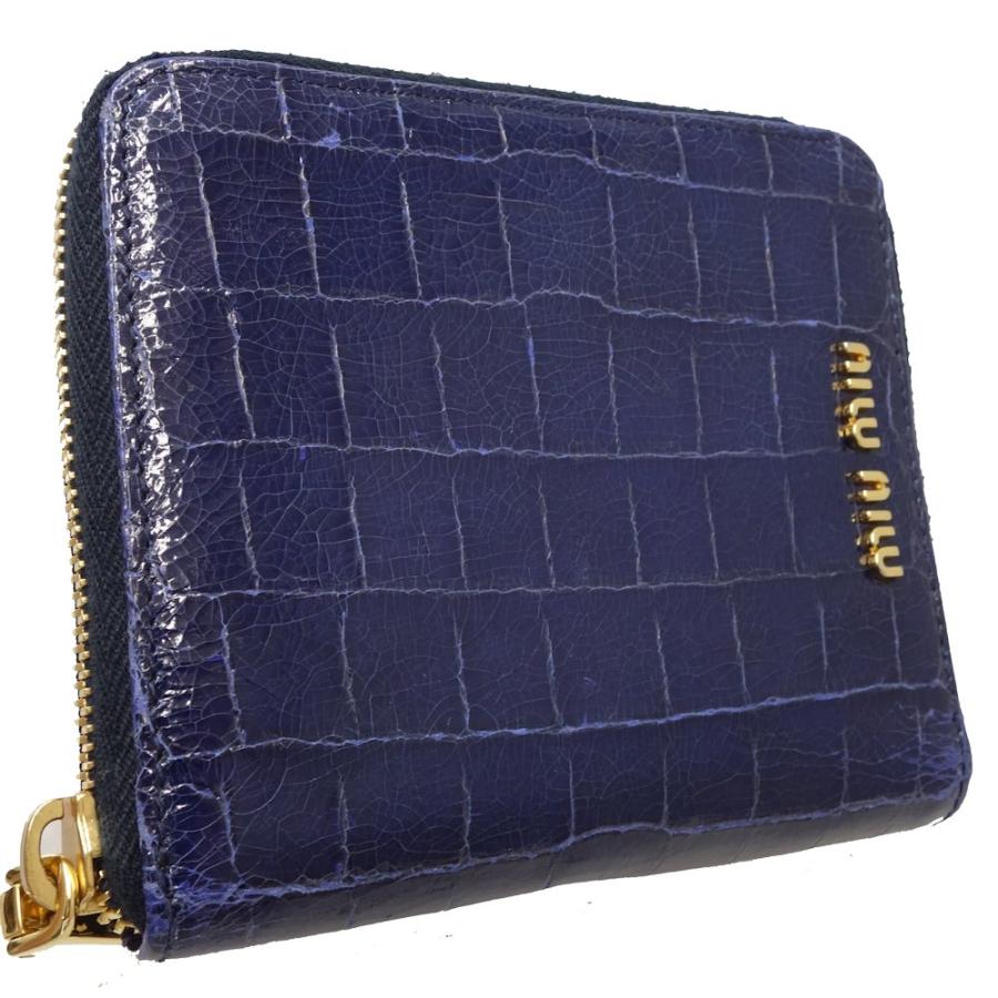 miu ミュウミュウ MIUMIU ラウンドファスナー 二つ折り財布型押し  