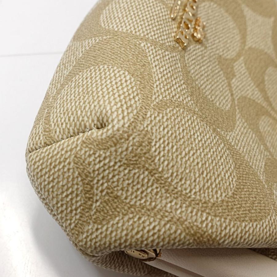 COACH（コーチ） ポーチ がま口 シグネチャー ノラキスロック C7518