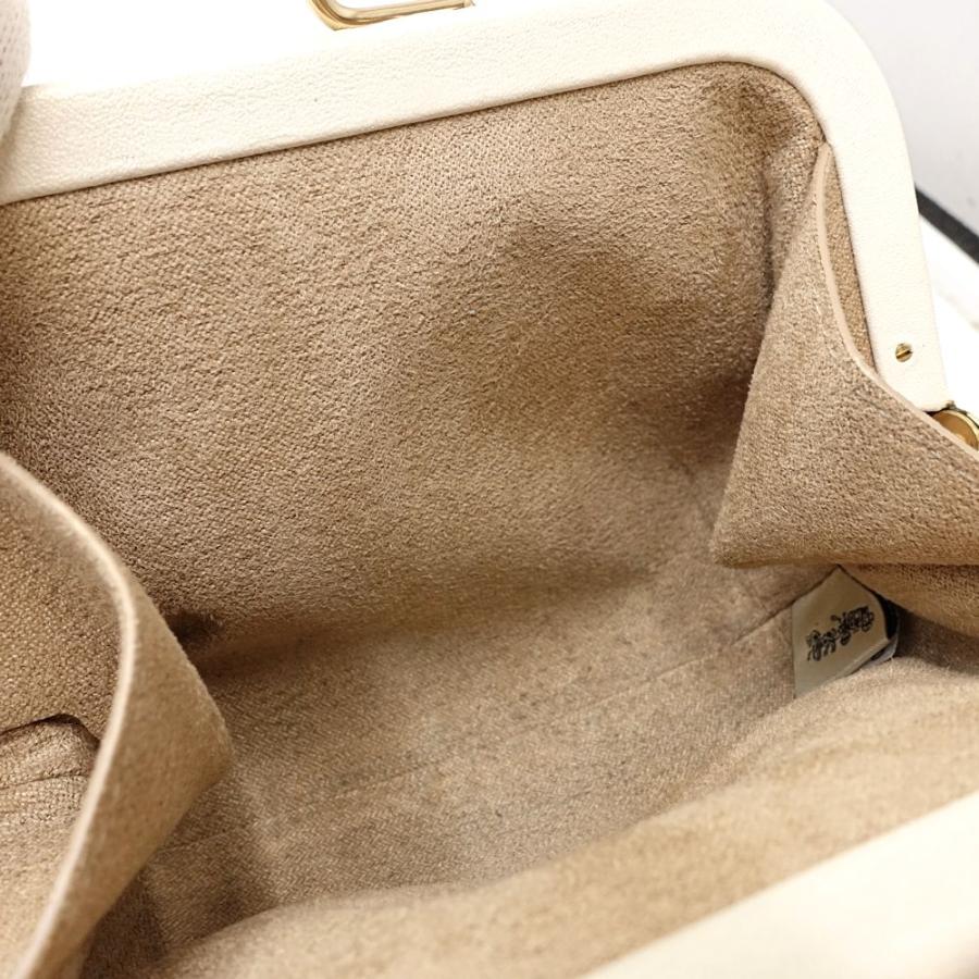COACH（コーチ） ポーチ がま口 シグネチャー ノラキスロック C7518