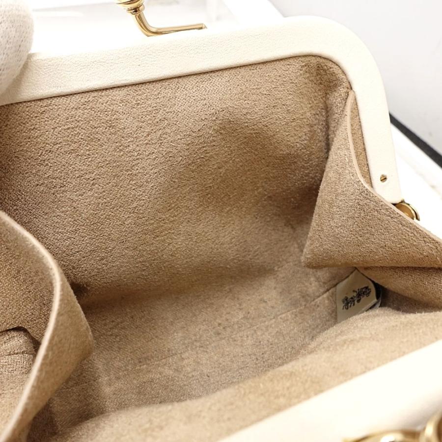 COACH（コーチ） ポーチ がま口 シグネチャー ノラキスロック C7518