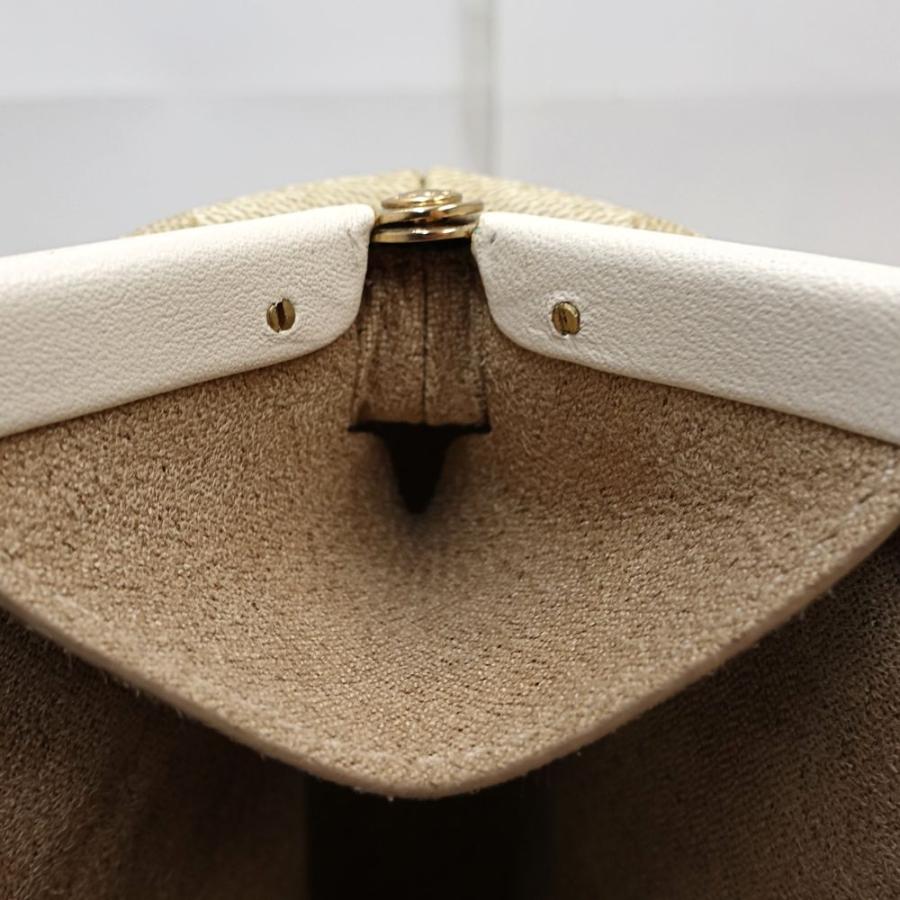 COACH（コーチ） ポーチ がま口 シグネチャー ノラキスロック C7518