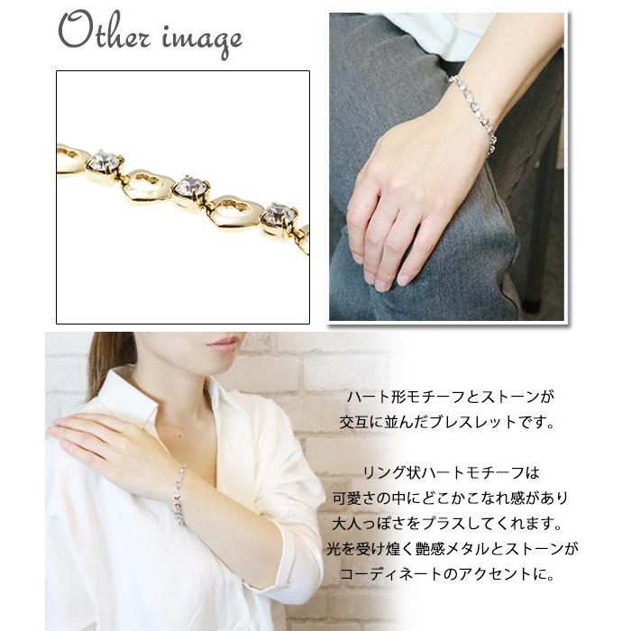 ハート形リングとクリアストーンのブレスレット クリア 艶感メタル 