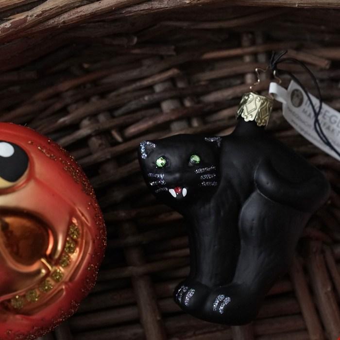 猫の顔 ガラスオーナメント 赤い稲妻 猫の顔 ガラスオーナメント 赤い