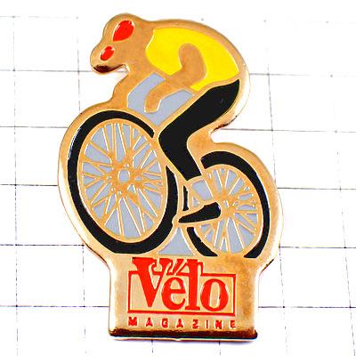 ピンバッジ・マイヨジョーヌ黄色シャツ自転車雑誌 VELO MAGAZINE LE