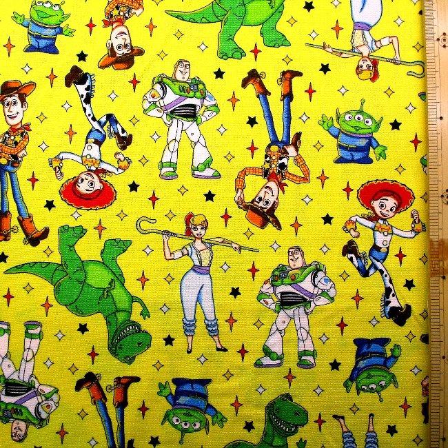 キャラクター 生地 布 トイストーリー （ イエロー系 ) 柄番号49