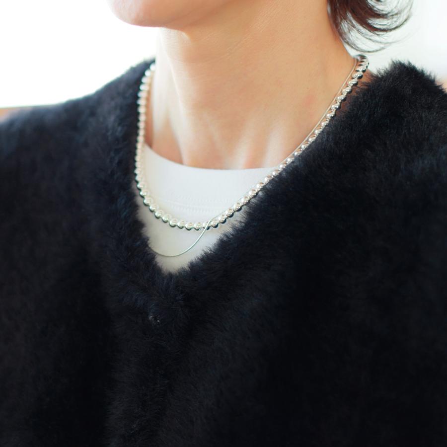 Dignite collier（ディニテコリエ） フェザーヤーン ペプラムジレ