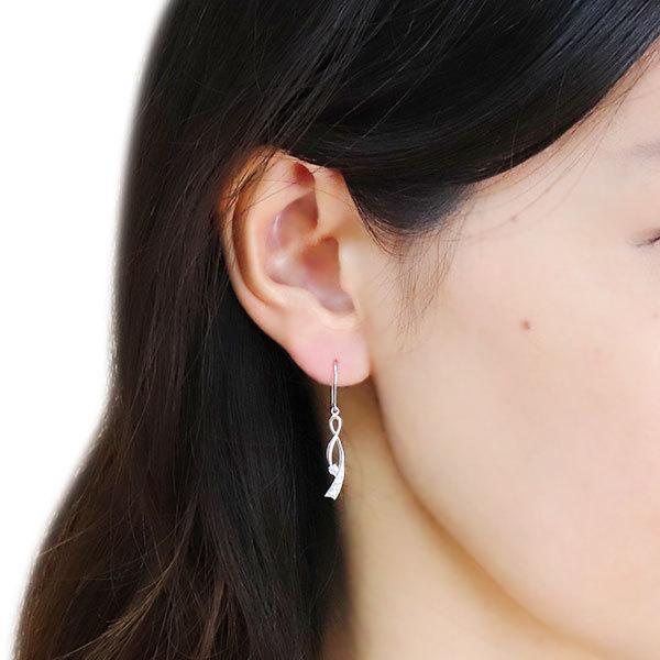 ピアス 18k 揺れる レディース インフィニティ 4月誕生石 ダイヤモンド りぼん k18 ピンク イエローの画像