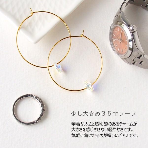 SWAROVSKI（スワロフスキー） フープピアス 大きめ ゴールド 金属