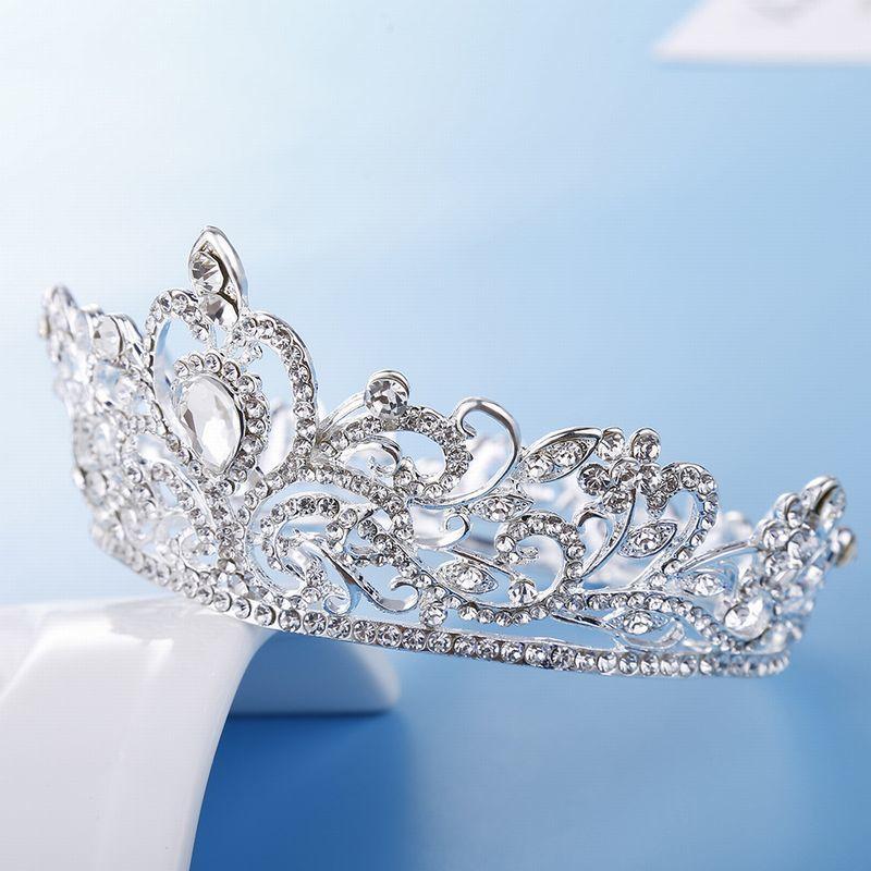 ティアラ 花嫁 ウエディング 結婚式 ブライダル 披露宴 パーティー 二次会 髪飾り ヘアアクセサリー ヘッドドレス クラウンティアラ 王冠 かんむり | plusnao | 10