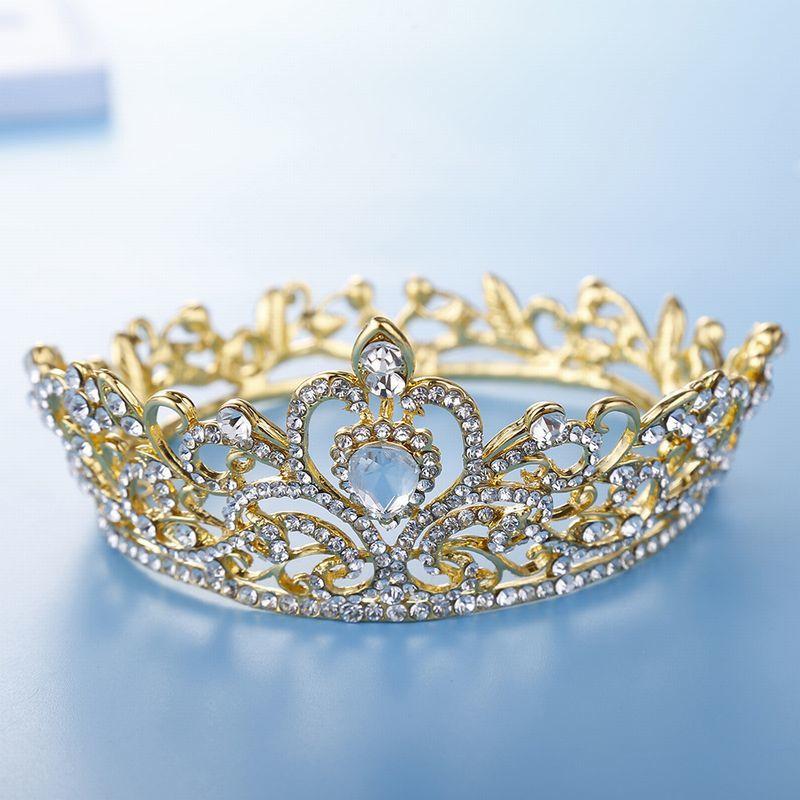 ティアラ 花嫁 ウエディング 結婚式 ブライダル 披露宴 パーティー 二次会 髪飾り ヘアアクセサリー ヘッドドレス クラウンティアラ 王冠 かんむり | plusnao | 01