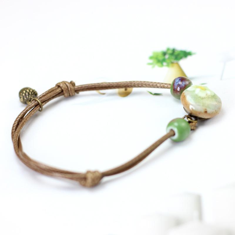 ブレスレット レディース アクセサリー 紐 フラワー 花 どんぐりモチーフ ドングリ 陶器風 ビーズ かわいい ガーリー おしゃれ お出かけ プレゼン プラスナオ Paypayモール店 通販 Paypayモール
