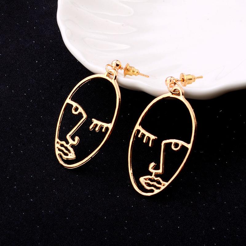 plusnao スタッドピアス フェイスモチーフ ユニークデザイン  