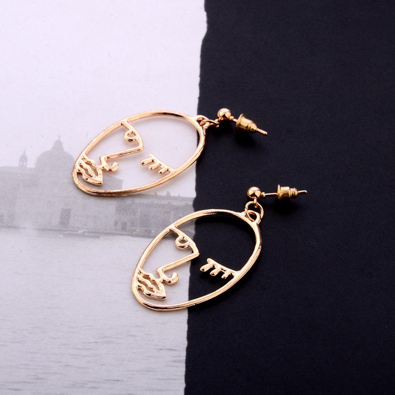 plusnao スタッドピアス フェイスモチーフ ユニークデザイン  