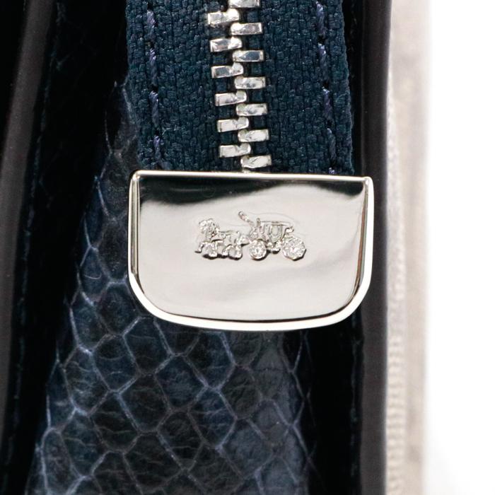 コーチ COACH クラッチバッグ PVC レザー シグネチャー 花柄 F72997  