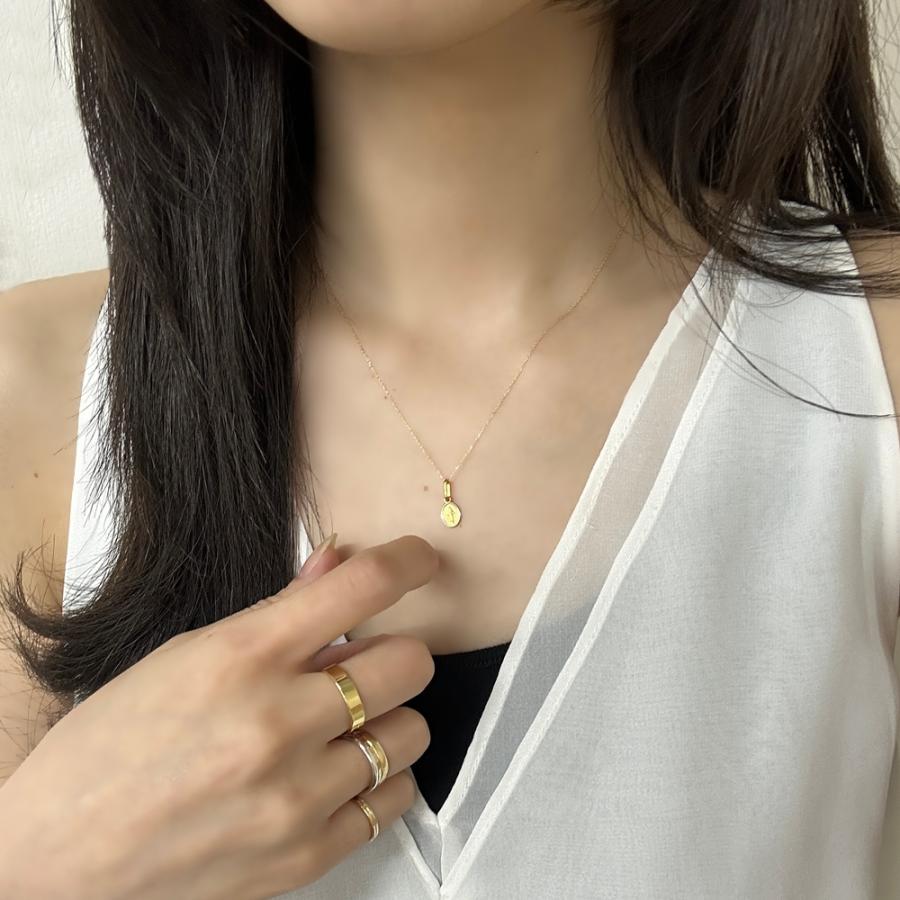 UNOAERRE（ウノアエレ） ショッパー付き 18金 ゴールド メダイ